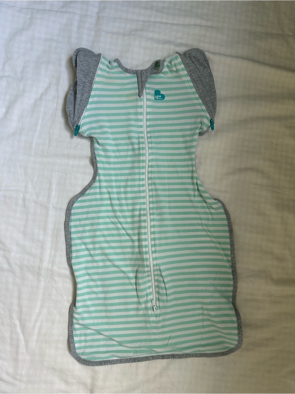 Love to dream mint and white striped arms out transition sleep sack swaddle